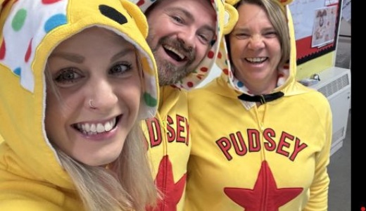 Picture showing 3 members of staff in Pudsey Bear costumes.