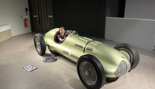 Y5 pupil in 1950s racing car at Silverstone museum.