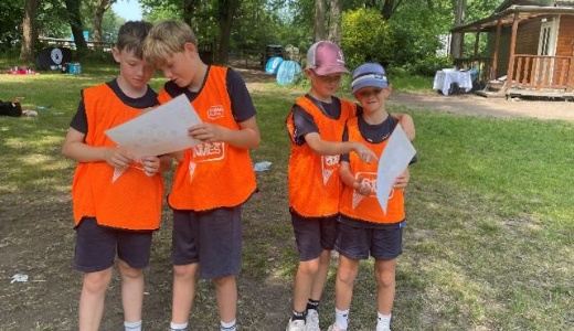 Photograph of Y4 children involved in orienteering competition.